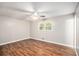 Bedroom with hardwood floors, ceiling fan and window at 155 S South Meadowcliff Cir, Carrollton, GA 30116