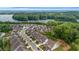 Beautiful aerial view of a neighborhood near a lake surrounded by lush green trees at 178 Sunshower Rdg, Canton, GA 30114