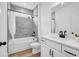 Modern bathroom with white vanity, marble-look tile, and sleek black fixtures at 178 Sunshower Rdg, Canton, GA 30114