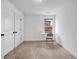 Bright bedroom with neutral carpet, a window, and closet providing a flexible space at 178 Sunshower Rdg, Canton, GA 30114