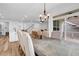 Dining area includes a large table with seating for six, and outdoor patio access at 178 Sunshower Rdg, Canton, GA 30114