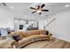 Open living area features hardwood floors, modern appliances, and convenient access to the kitchen at 178 Sunshower Rdg, Canton, GA 30114