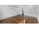 Spacious bedroom with hardwood floors, crisp white walls, and ample natural light at 1870 Avon Sw Ave, Atlanta, GA 30311