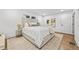 Spacious bedroom showcasing a king-sized bed, neutral decor, and ample natural light at 1870 Avon Sw Ave, Atlanta, GA 30311