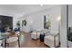Comfortable living area featuring hardwood floors, modern seating, and open layout perfect for relaxing or entertaining guests at 1870 Avon Sw Ave, Atlanta, GA 30311