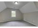 Cozy bedroom with carpet and window providing natural light at 23 Club Dr, Locust Grove, GA 30248