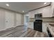 Kitchen featuring modern white cabinets and stainless steel appliances at 23 Club Dr, Locust Grove, GA 30248