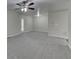 Bright living room features new carpet and neutral walls providing a blank slate to make the room your own at 23 Club Dr, Locust Grove, GA 30248
