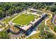 Aerial view shows a modern, mixed-use facility with green spaces, landscaping, and parking at 297 Atlanta Se Ave # 8, Atlanta, GA 30315