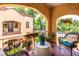 Charming balcony view with terracotta tile, blooming flowers, and comfortable wicker furniture at 297 Atlanta Se Ave # 8, Atlanta, GA 30315