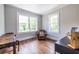 Bright bedroom with hardwood floors, large windows, and neutral paint for a serene atmosphere at 297 Atlanta Se Ave # 8, Atlanta, GA 30315