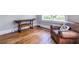 Bedroom featuring rich hardwood flooring and a cozy leather armchair at 297 Atlanta Se Ave # 8, Atlanta, GA 30315