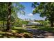 Scenic view with a modern glass building, lush greenery, and the Atlanta skyline in the background at 297 Atlanta Se Ave # 8, Atlanta, GA 30315