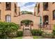Charming courtyard entrance with manicured landscaping and wrought iron details at 297 Atlanta Se Ave # 8, Atlanta, GA 30315