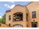Exterior view of a home with an upper-level balcony, textured walls, and unique architecture at 297 Atlanta Se Ave # 8, Atlanta, GA 30315