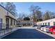 Artist Cove featuring a parking lot with multiple vehicles and architectural detail at 297 Atlanta Se Ave # 8, Atlanta, GA 30315