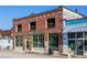 Charming brick building with Halfway Crooks signage, perfect for a unique business opportunity at 297 Atlanta Se Ave # 8, Atlanta, GA 30315