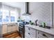 Well-equipped kitchen with modern appliances, white subway tile, and lots of counter space at 297 Atlanta Se Ave # 8, Atlanta, GA 30315