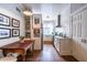 Galley kitchen featuring white subway tile, stainless steel appliances, and a cozy breakfast nook at 297 Atlanta Se Ave # 8, Atlanta, GA 30315