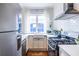 Charming kitchen boasts stainless steel appliances, a farmhouse sink, and ample natural light at 297 Atlanta Se Ave # 8, Atlanta, GA 30315
