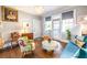 Charming living room featuring bright windows, hardwood floors, and stylish furniture at 297 Atlanta Se Ave # 8, Atlanta, GA 30315