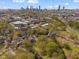 Stunning aerial view showcasing the property's proximity to the Atlanta skyline and surrounding green spaces at 958 Austin Ne Ave, Atlanta, GA 30307