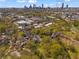 Picturesque aerial view with downtown in the background, highlighting the lush surroundings and neighborhood at 958 Austin Ne Ave, Atlanta, GA 30307