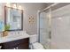 Updated bathroom with new vanity, modern fixtures, and tiled shower at 958 Austin Ne Ave, Atlanta, GA 30307