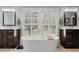 Luxurious bathroom featuring a modern tub and and vanities at 958 Austin Ne Ave, Atlanta, GA 30307