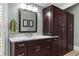Custom dark wood cabinets accent the bathroom vanity at 958 Austin Ne Ave, Atlanta, GA 30307