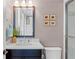 Bright bathroom with updated vanity, fixtures and glass enclosed shower at 958 Austin Ne Ave, Atlanta, GA 30307
