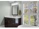 The bathroom vanity has marble countertops and an exterior view at 958 Austin Ne Ave, Atlanta, GA 30307