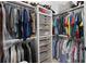 Spacious walk-in closet with ample hanging space, shelving, and drawer storage for organization at 958 Austin Ne Ave, Atlanta, GA 30307
