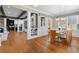 Bright dining room with hardwood floors, decorative columns and large windows at 958 Austin Ne Ave, Atlanta, GA 30307