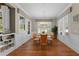 Elegant dining room with hardwood floors and a view of the outdoors at 958 Austin Ne Ave, Atlanta, GA 30307