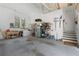 Spacious garage with ample storage and workspace, with a door to the exterior at 958 Austin Ne Ave, Atlanta, GA 30307
