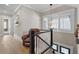 Hallway sitting area with hardwood floors and a unique chandelier at 958 Austin Ne Ave, Atlanta, GA 30307