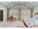 Spacious main bedroom with a writing desk and vaulted ceiling at 958 Austin Ne Ave, Atlanta, GA 30307