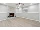 Spacious finished basement features a fireplace and wood floors at 1277 Muirforest Dr, Stone Mountain, GA 30088