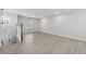 Inviting living area featuring wood floors, neutral paint, and an abundance of natural light at 1277 Muirforest Dr, Stone Mountain, GA 30088