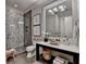 Modern bathroom featuring a glass-enclosed shower and stylish vanity with a vessel sink at 272 Lake Forrest Ne Ln, Atlanta, GA 30342