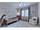 bedroom decorated with car-themed accents, features a playful design, and a cozy atmosphere at 272 Lake Forrest Ne Ln, Atlanta, GA 30342