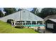 An inviting community pool with tented cover and lounge chairs offers relaxation and recreation at 272 Lake Forrest Ne Ln, Atlanta, GA 30342