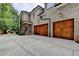 Home with a well-maintained lawn, three-car garage, and a play area at 272 Lake Forrest Ne Ln, Atlanta, GA 30342