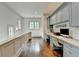 Hallway workspace with built-in desks, drawers, and modern chairs at 272 Lake Forrest Ne Ln, Atlanta, GA 30342