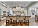 Spacious kitchen with a center island, ample counter seating, and modern appliances at 272 Lake Forrest Ne Ln, Atlanta, GA 30342