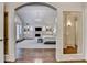 Spacious main bedroom with a fireplace, built-in shelving, and a doorway to a walk-in closet at 272 Lake Forrest Ne Ln, Atlanta, GA 30342