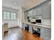Hallway workspace with built-in desks, drawers, and modern chairs at 272 Lake Forrest Ne Ln, Atlanta, GA 30342