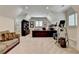 Spacious office with built-in shelving, a large desk, and natural light at 272 Lake Forrest Ne Ln, Atlanta, GA 30342