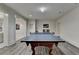 Spacious recreation room with a classic ping pong table, perfect for entertainment and Gathering fun at 272 Lake Forrest Ne Ln, Atlanta, GA 30342